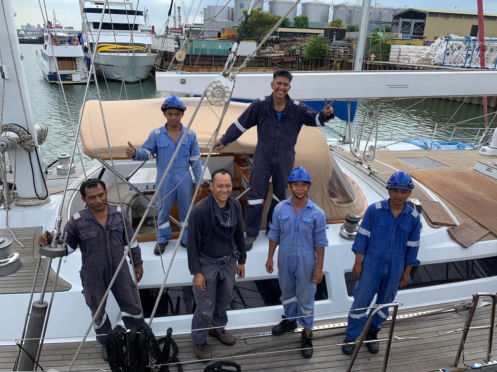 Dedicated sustainable refit crew on deck at Singapore shipyard
